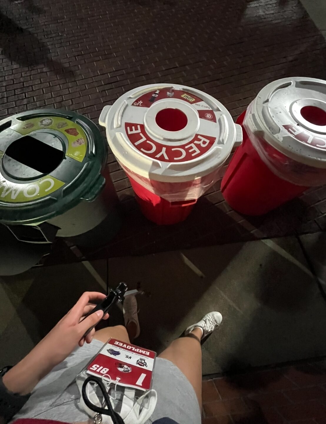 Sorting trash at a recycling station in the Football Stadium