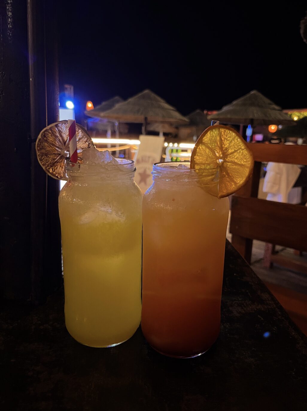 Saudade: The Feeling I Carried Home from Portugal 6 IMG 0548 e1765719177606 Two cocktails at a beach bar in Nazaré in the evening.