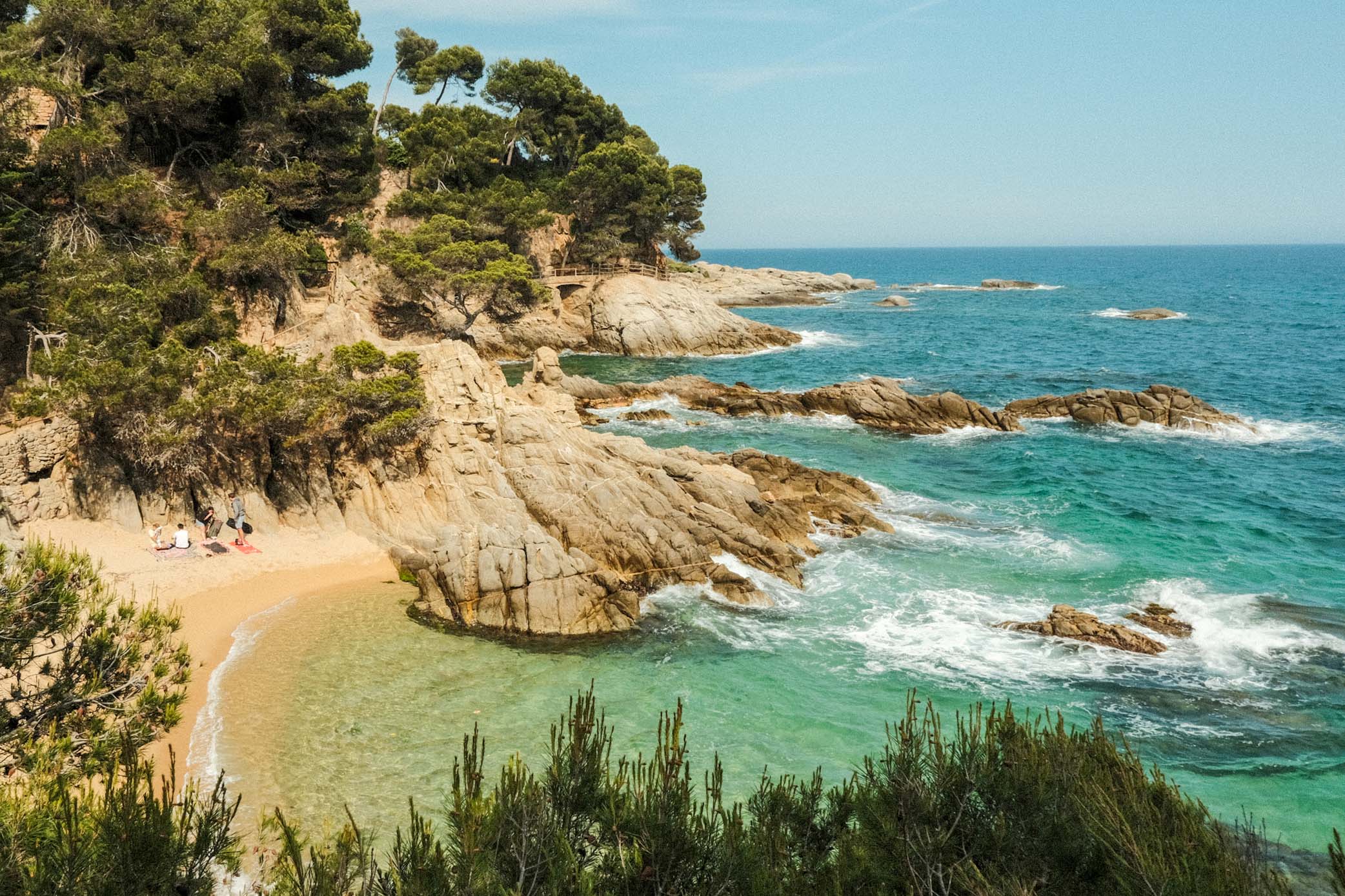 "Living La Vida Loca" in Barcelona 10 IMG 8230 Coastal view with rocks, sand and blue water.